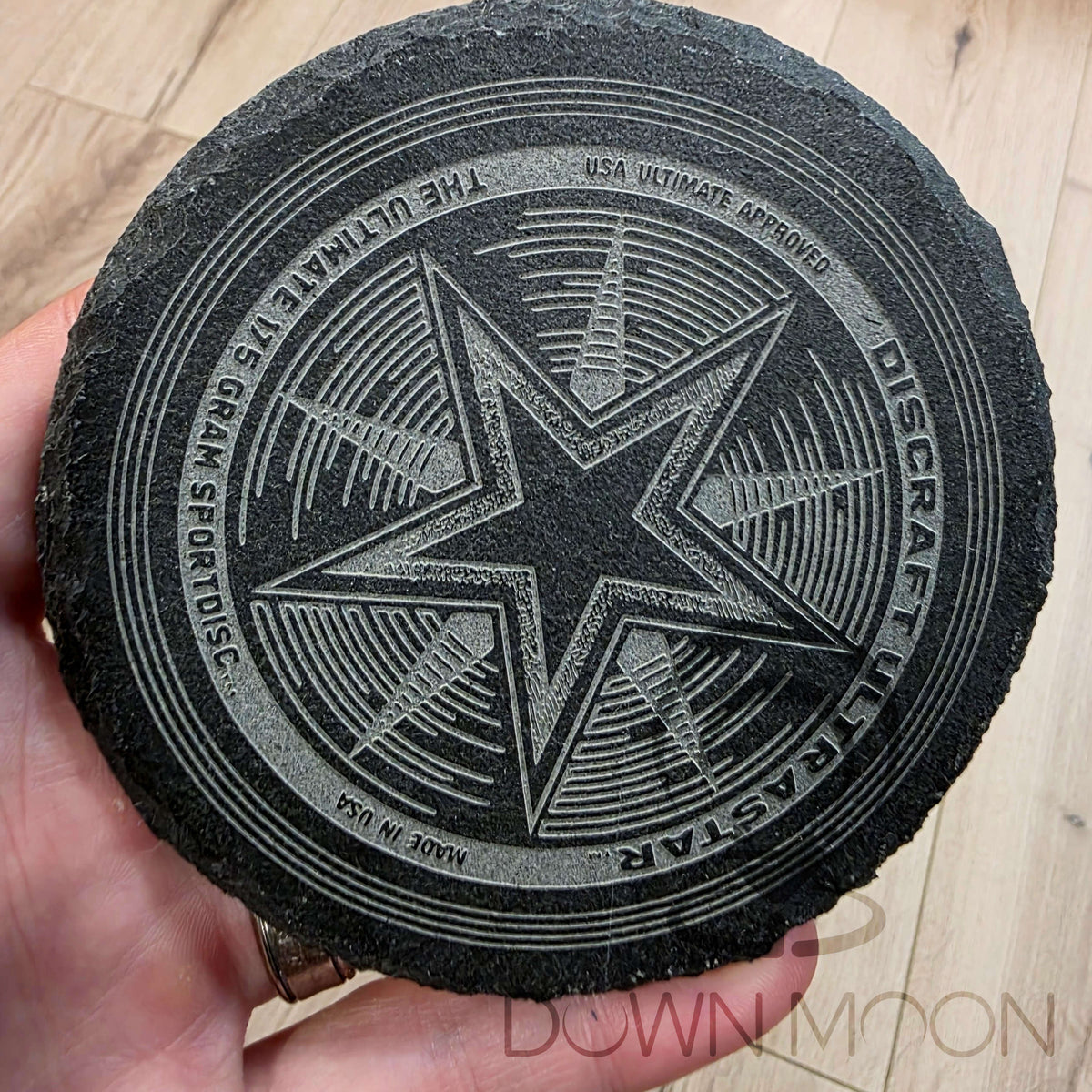 Slate coaster engraved to look like a frisbee